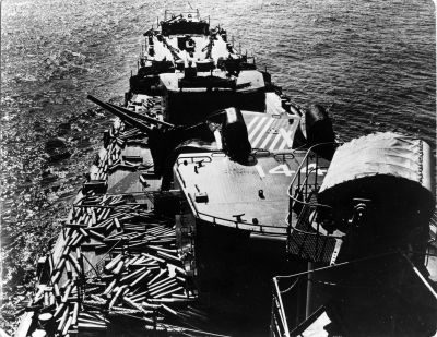 076_Off_Korea_Oct_1950_East_Coast_Shore_Bombardment_-_Empty_Casings_after_Bombardment.jpg