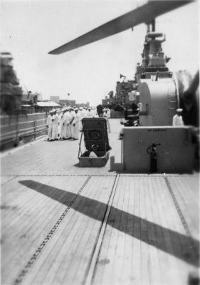 020d_6-23-1951_Genoa_-_Looking_fwd_from_flight_deck_-_Adam_going_down_hatch_28Frank_Colletti29.jpg