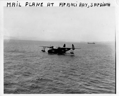 015b_10_Oct_53_Arancia_Bay2C_Sardinia_-_Navy_mail_plane_-_first_mail_from_the_US_28Dick_Kerry29.jpg